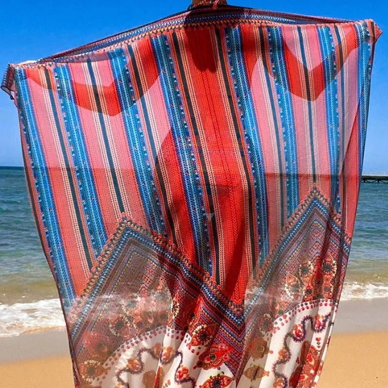 Women's three-piece swimsuit set showing high-waisted bikini bottom, cutout blouse, and matching cover-up coat in a printed design.