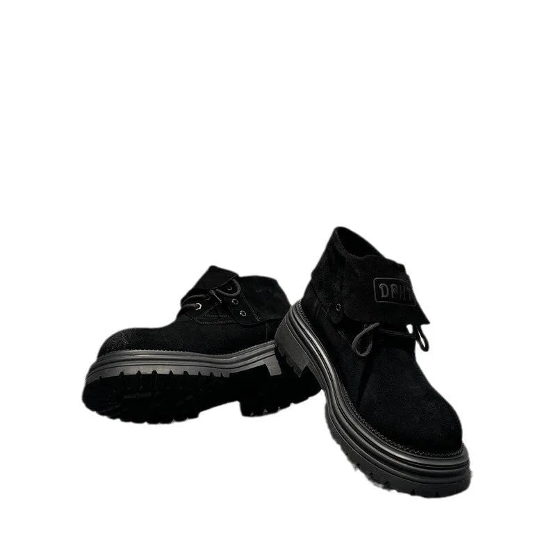 Retro distressed worker style boots in cow suede with thick soles and visible sewing lines