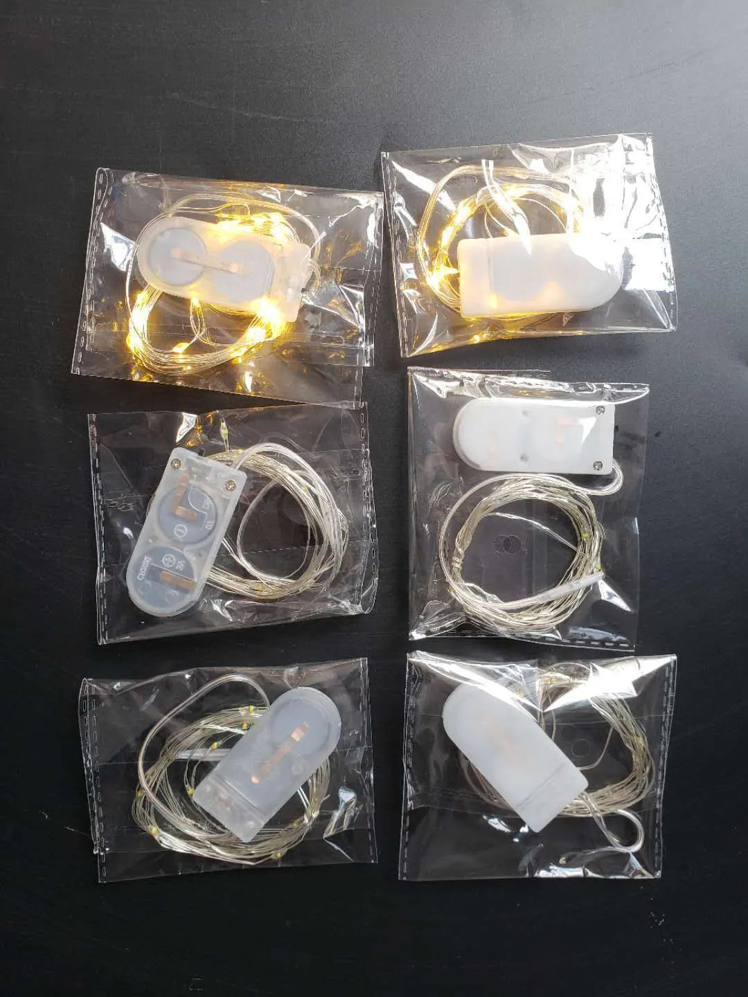 Copper wire LED light string with battery box showing flexible decorative lighting