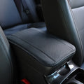 Black PU leather car armrest box cushion mat with red stitching, sized 32cm by 19cm