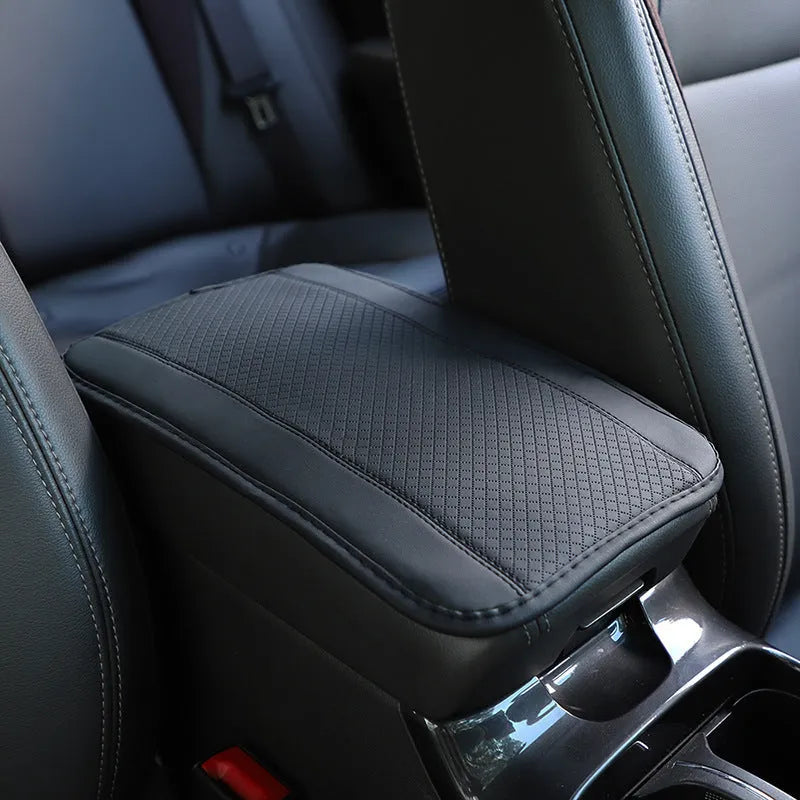 Black PU leather car armrest box cushion mat with red stitching, sized 32cm by 19cm