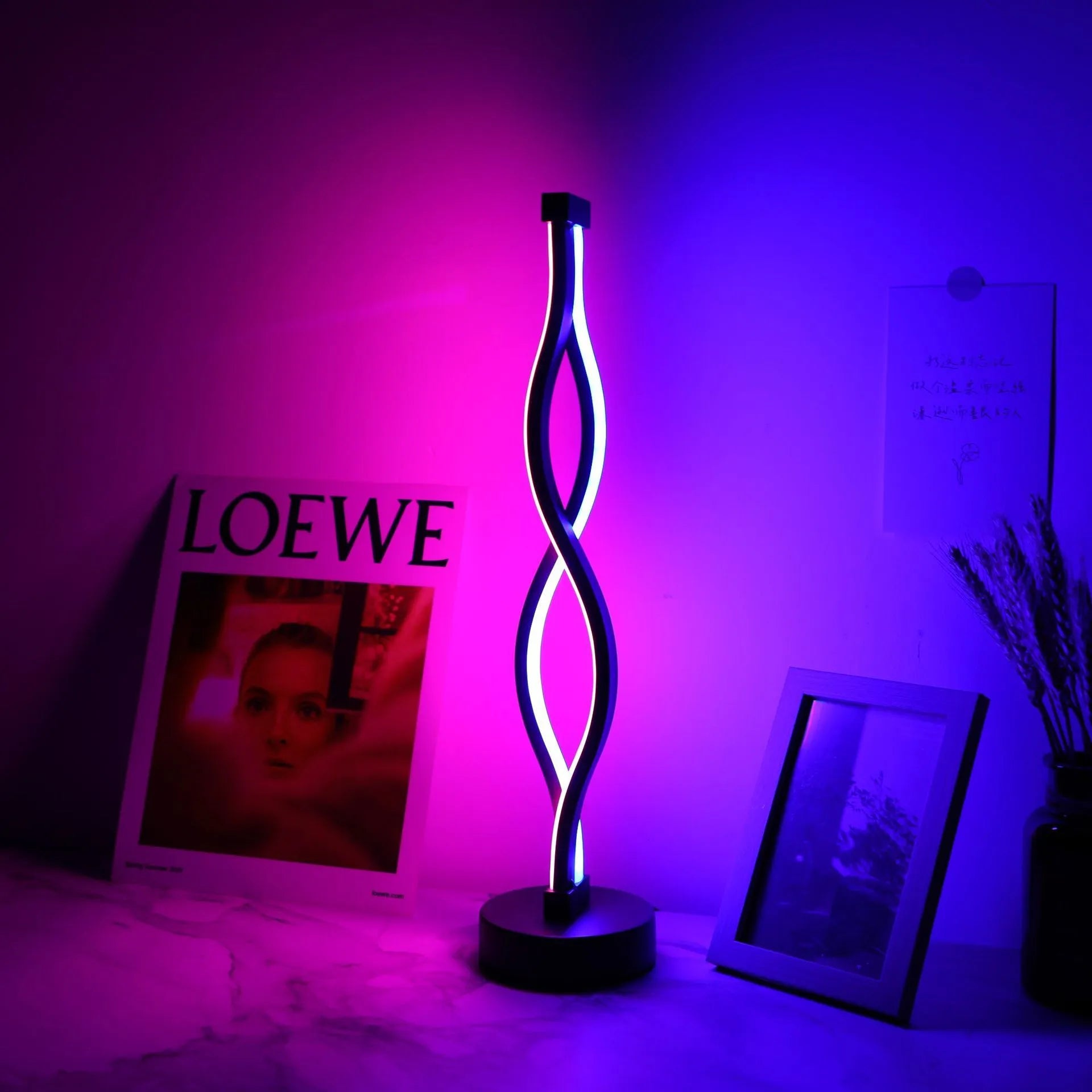 Black aluminium USB desk lamp with button control for three colour dimmable lighting.