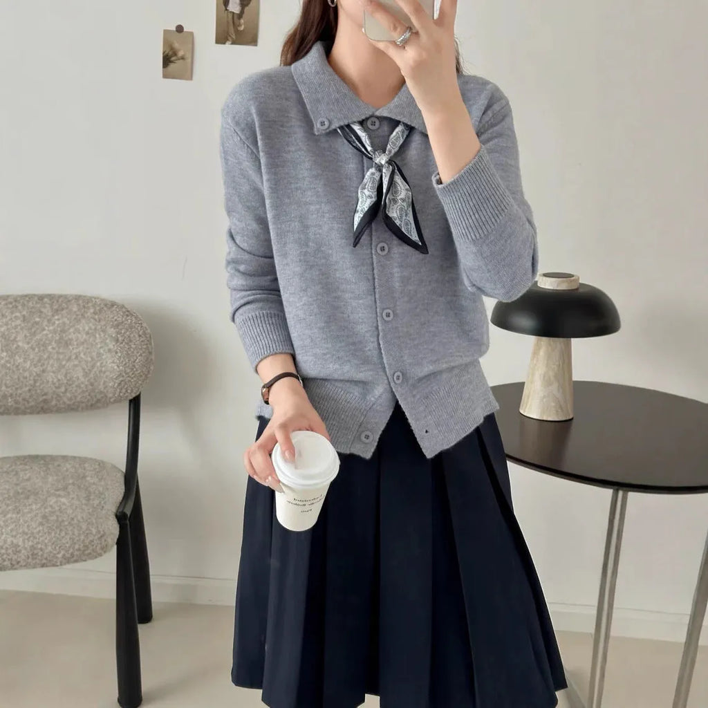 Lapel scarf sweater in cardigan style with long sleeves and splicing details