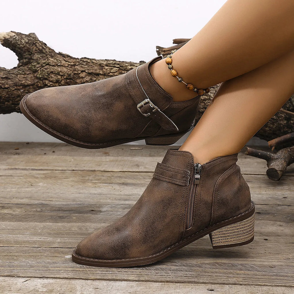 Autumn pointed female boots with chunky heel and belt buckle detail in black