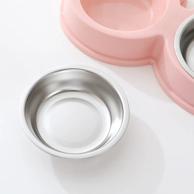 Blue stainless steel double pet bowl for cats and dogs with non-slip rubber base.