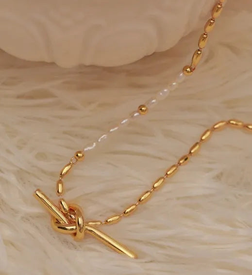 Gold copper real pearl necklace with geometric ring and line design on adjustable chain