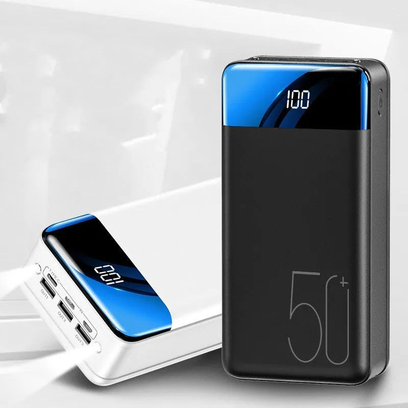 Large black and white 50000 mAh power bank showing three USB output ports