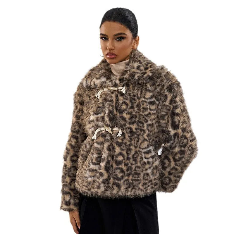 Women's leopard print fashion coat with a buckle lapel on the collar.