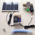 Automatic solar chicken and duck feeding machine with timer display and watertight outdoor housing.
