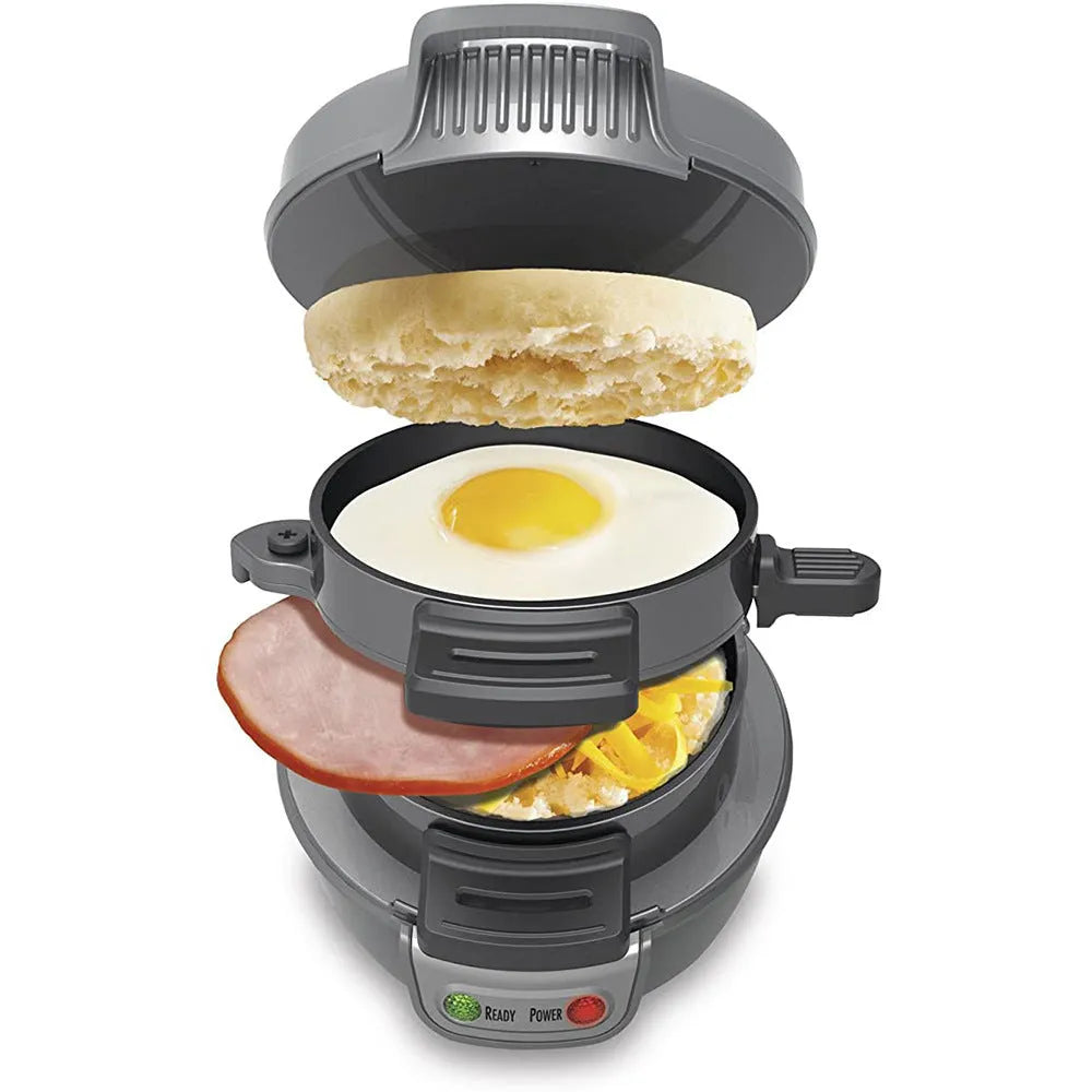 Bright red household breakfast machine sandwich toaster with egg cooker ring on a kitchen counter.