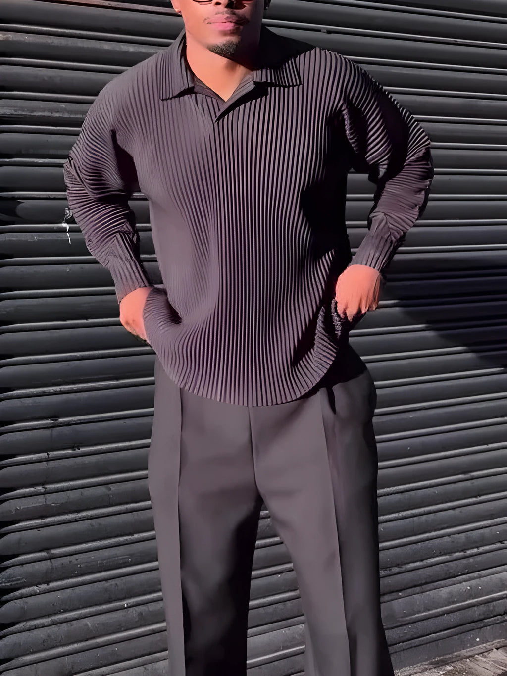 Black men's long-sleeved casual top with a pleated front detail, shown in a regular fit.