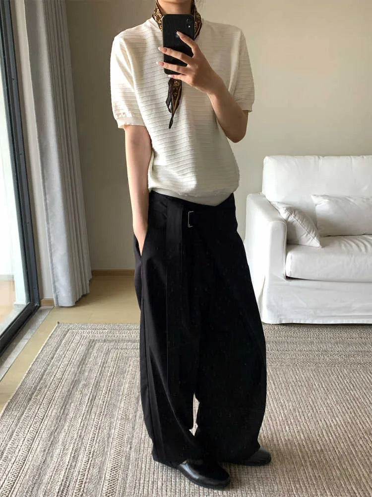 Black straight-leg trousers with adjustable waist and single pleat detailing