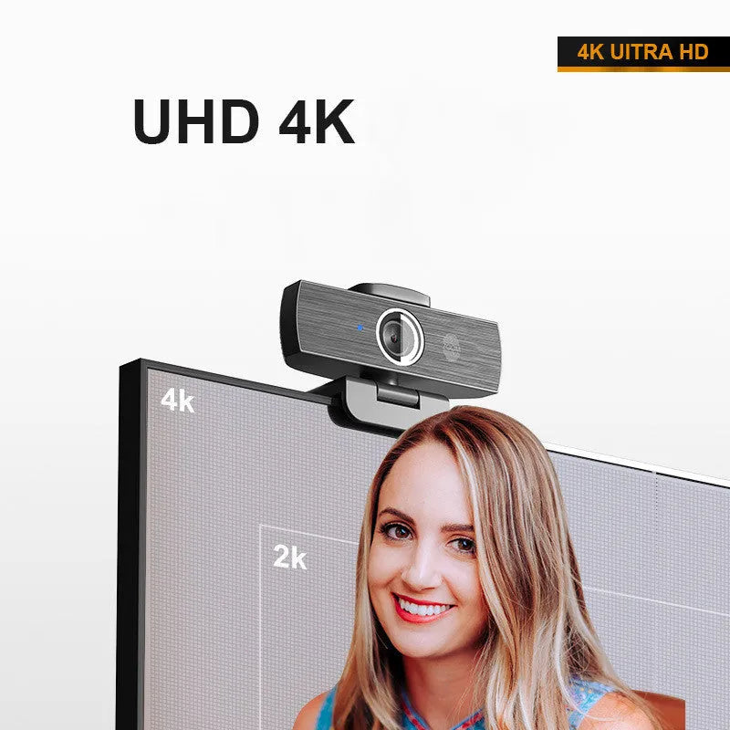 Black USB computer webcam with magnetic privacy cover shown detached