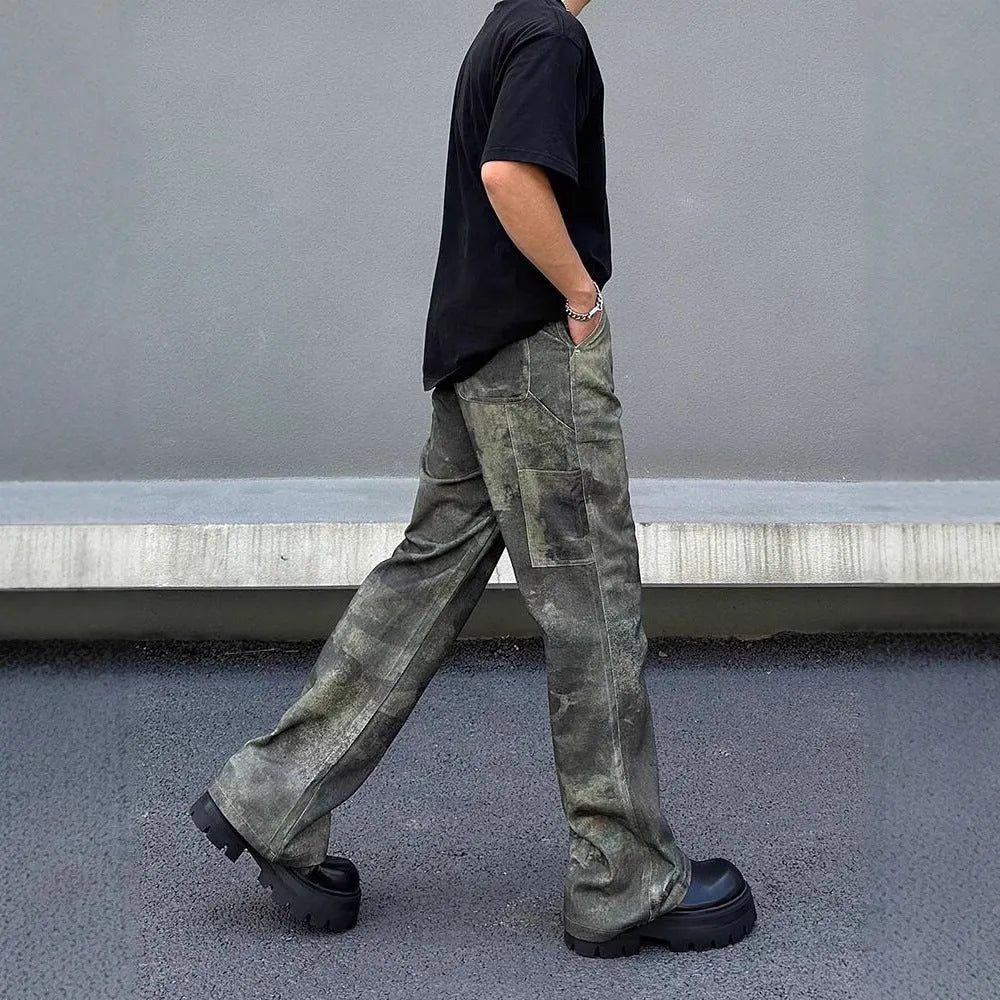 Men's straight leg jeans with a retro digital camouflage print on blue denim.