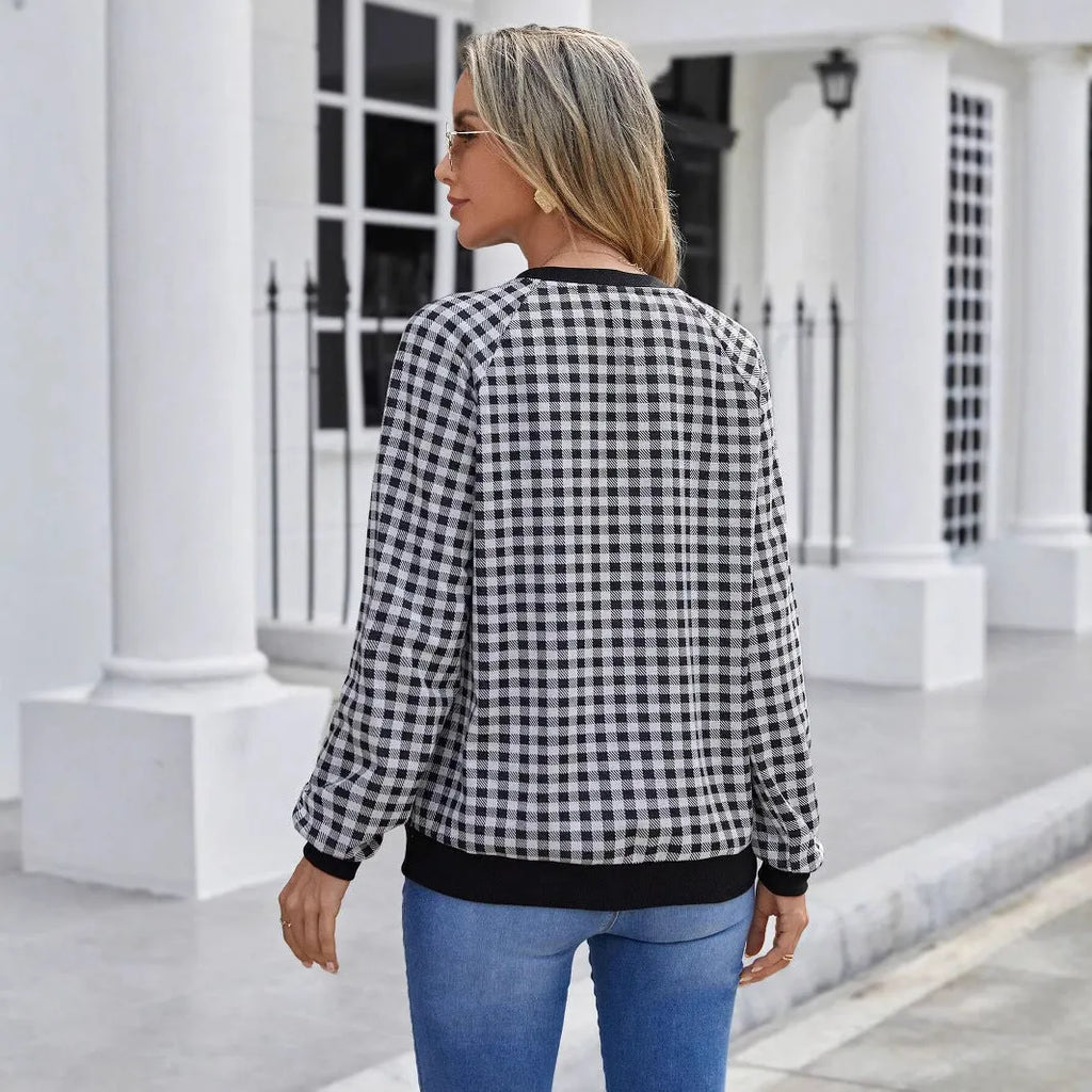 Black long sleeve women's pullover sweater with a Japanese sweet plaid and stripe print pattern.