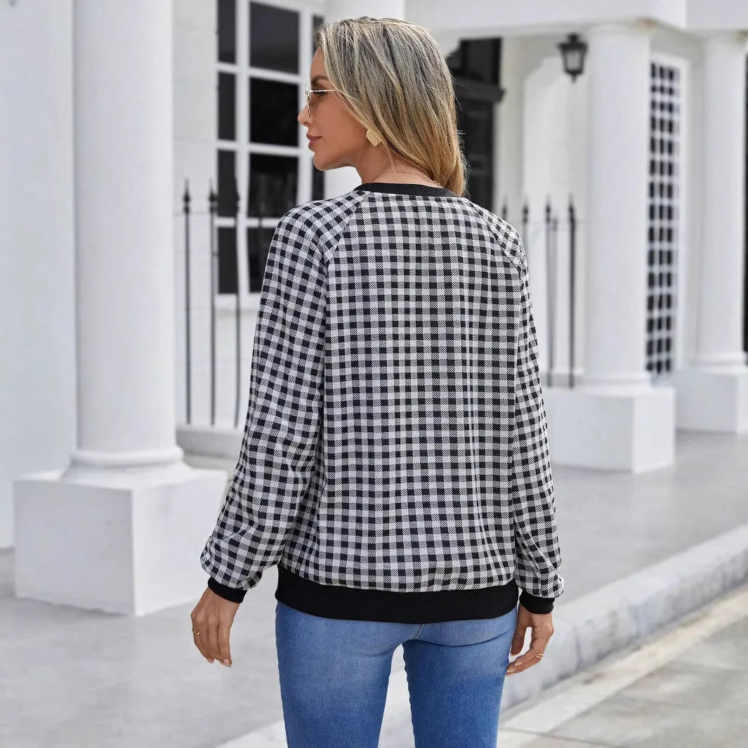 Black long sleeve women's pullover sweater with a Japanese sweet plaid and stripe print pattern.