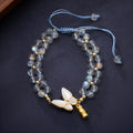 Grey moonstone woven bracelet with butterfly charm for women