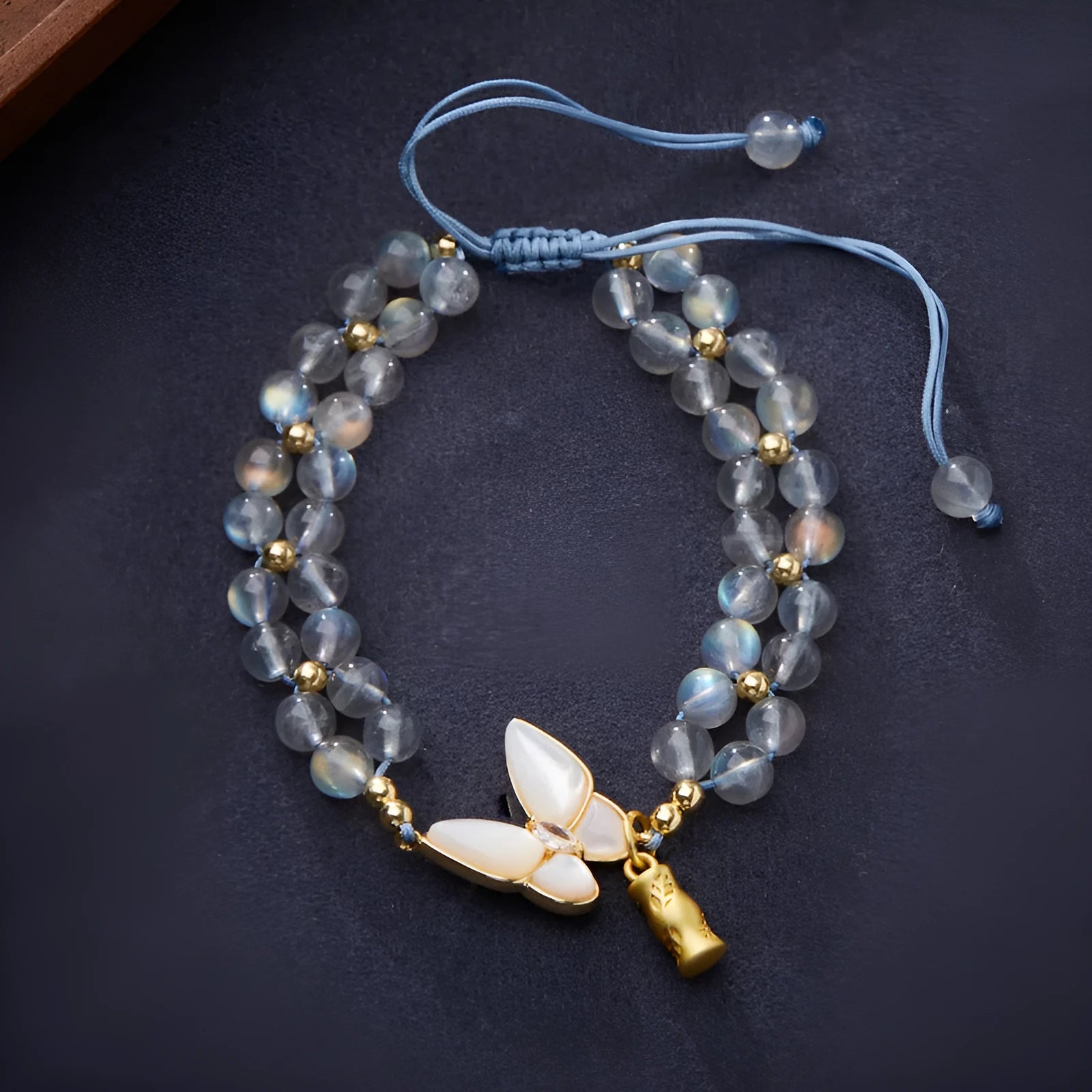 Grey moonstone woven bracelet with butterfly charm for women