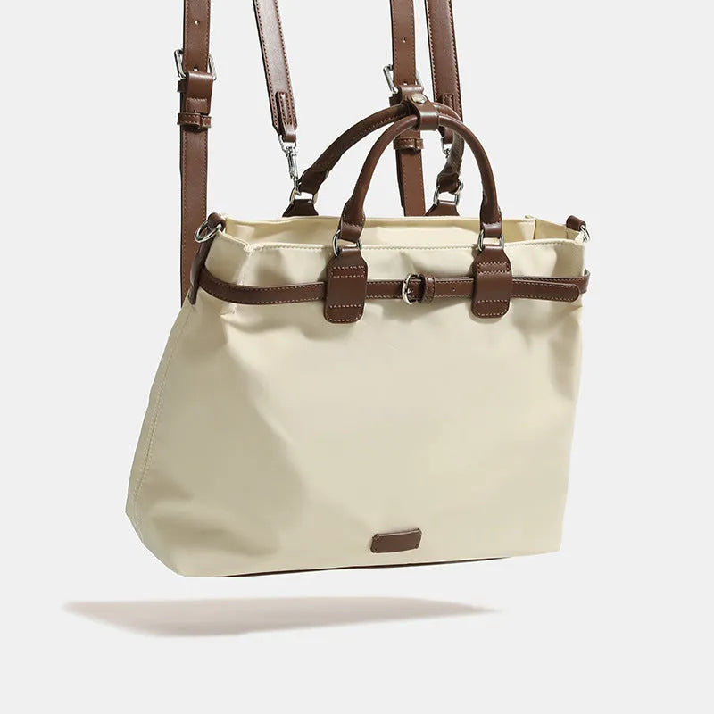 Women's nylon shoulder tote bag in creamy-white colour showing internal compartments and three shoulder straps