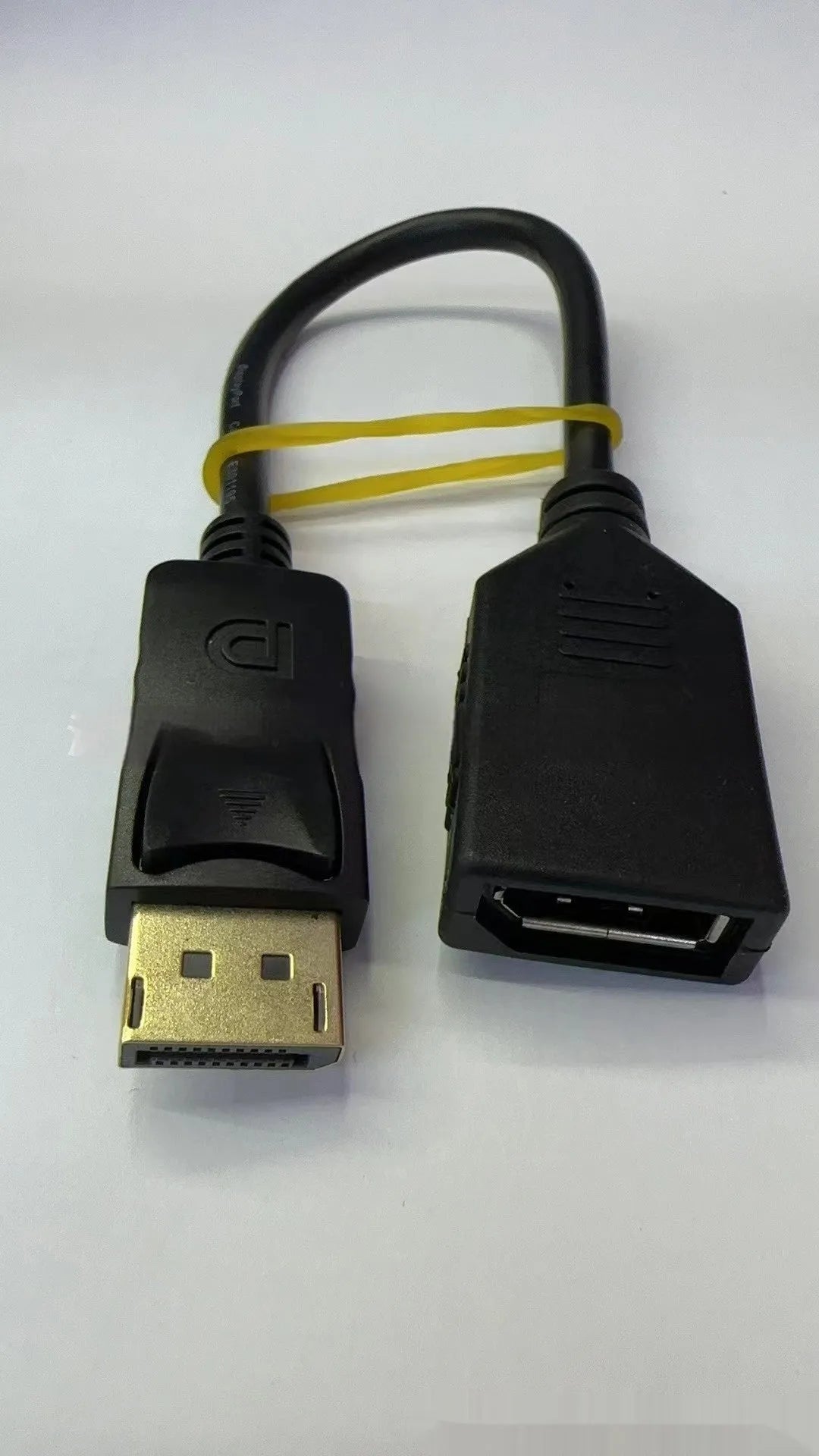 Black DisplayPort DP male to female extension cable with rotating busbar, approximately 10cm long