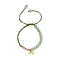 Red rope hand woven women's bracelet with floral decorative elements in BZ479 colour