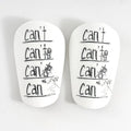 A pair of PU football shin guards for sports protection, shown in available colours and sizes S and XS.