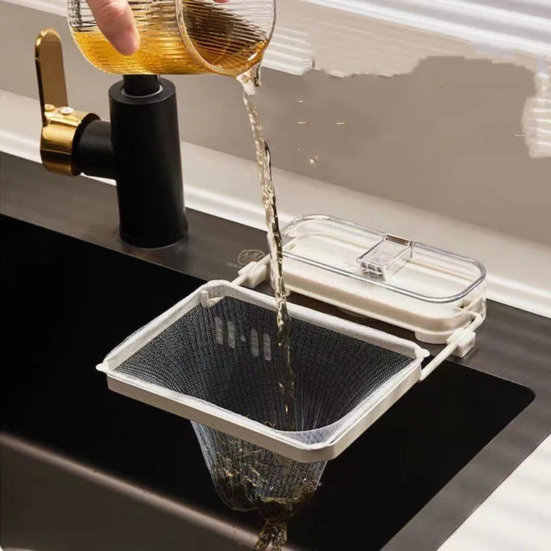 Dark green gold kitchen sink filter rack with suction cups and disposable filter screens on stainless steel sink