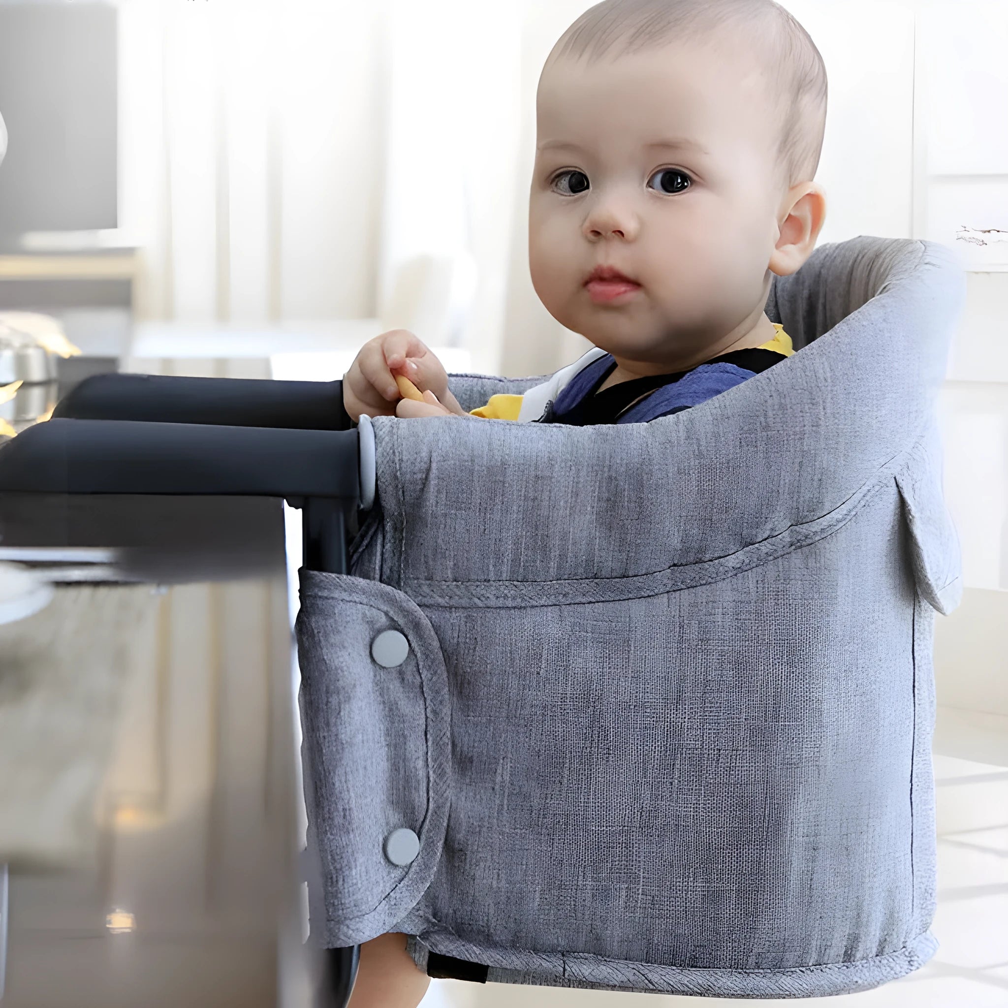 Portable baby dining cover seat with safety belt on a dining chair