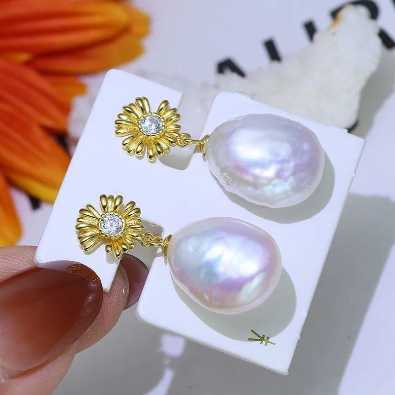 S925 sterling silver baroque flower drop earrings and matching ring holder set on a plain background.