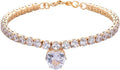 Gold heart-shaped rhinestone dog collar on a white background, showing shiny crystals and adjustable clasp.