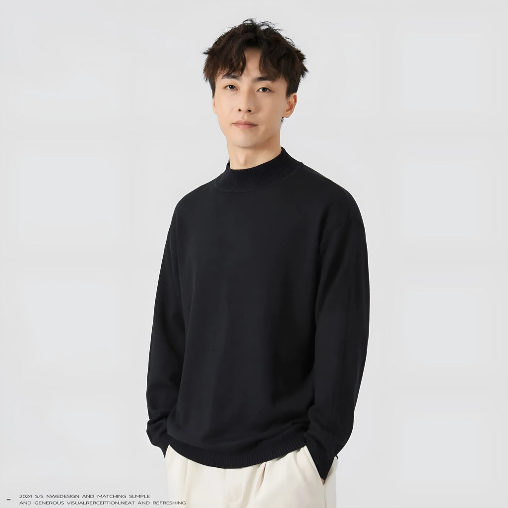Men's loose fit long sleeve casual jumper in army green colour on a hanger.