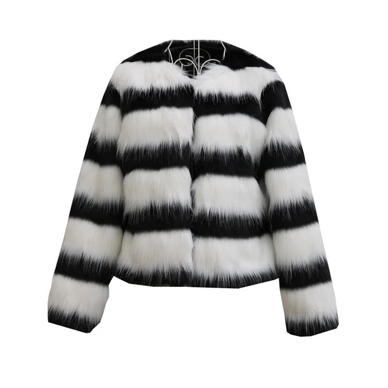 Women's black and white striped faux fur leather jacket with regular sleeves.