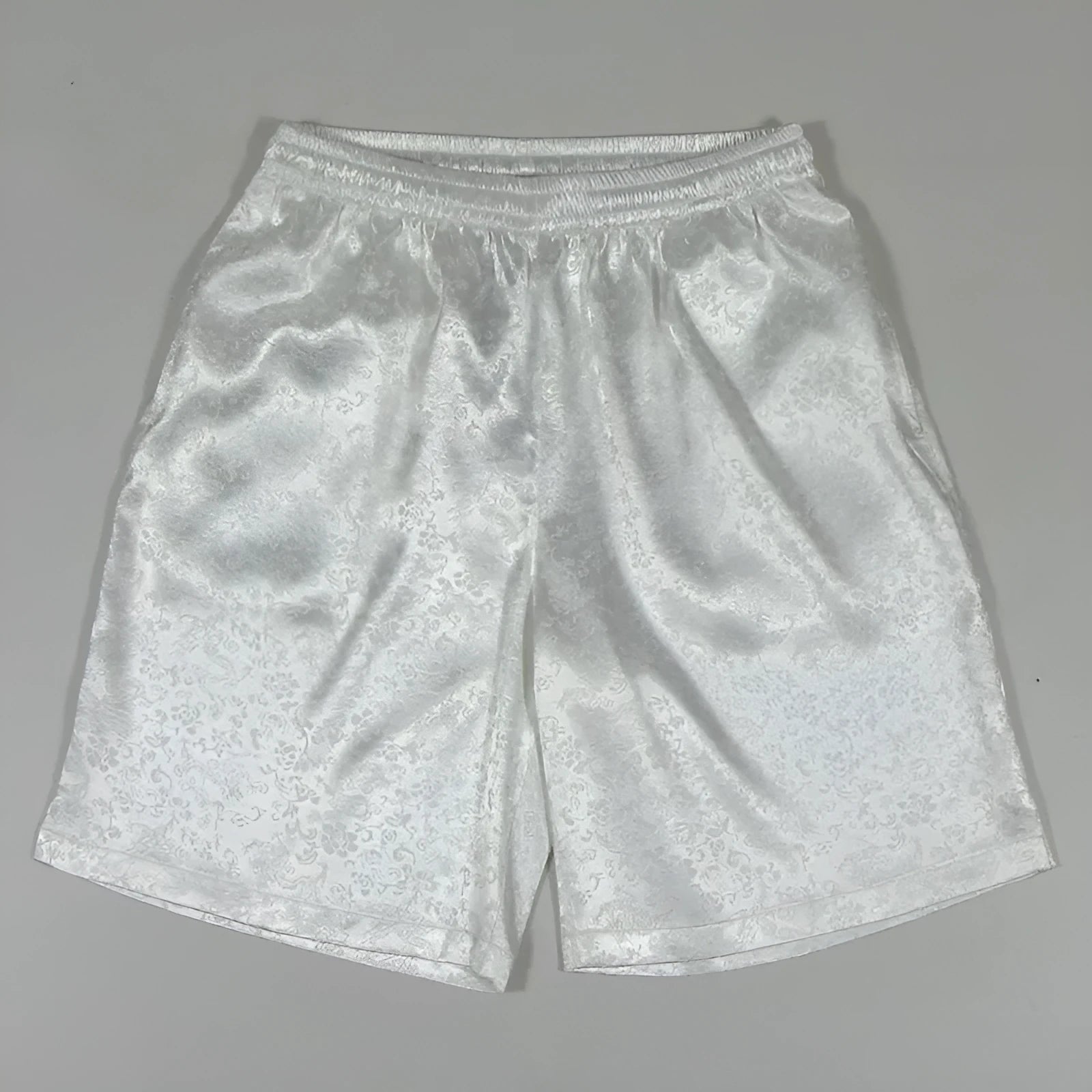 Men's black Tang suit style shorts with an elastic drawstring waistband for martial arts practice