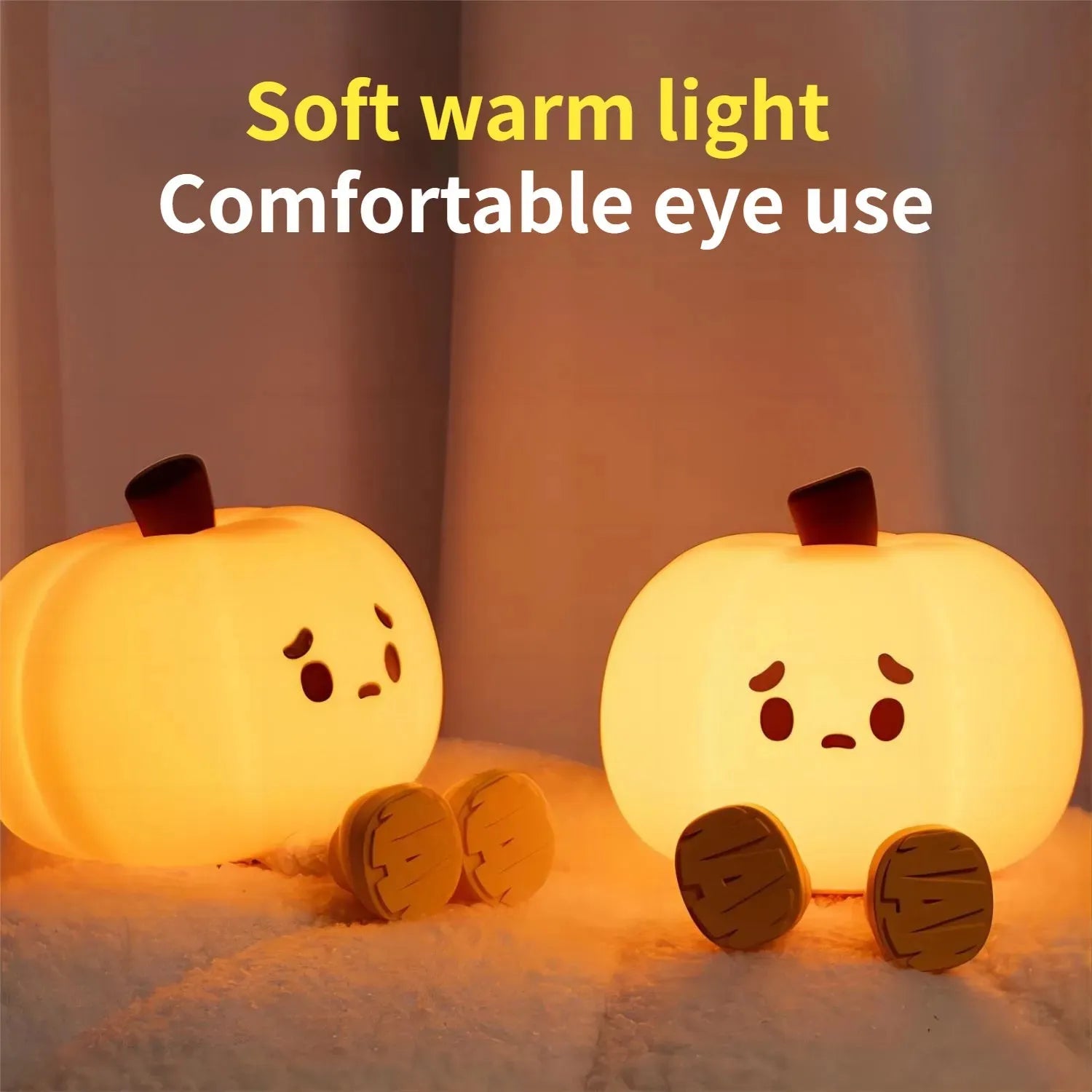 Orange pumpkin-shaped silicone night light with soft glowing illumination