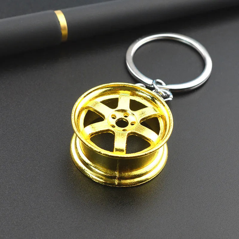 Wheel hub design metal keychain in zinc alloy with gold, silver or gun black finish