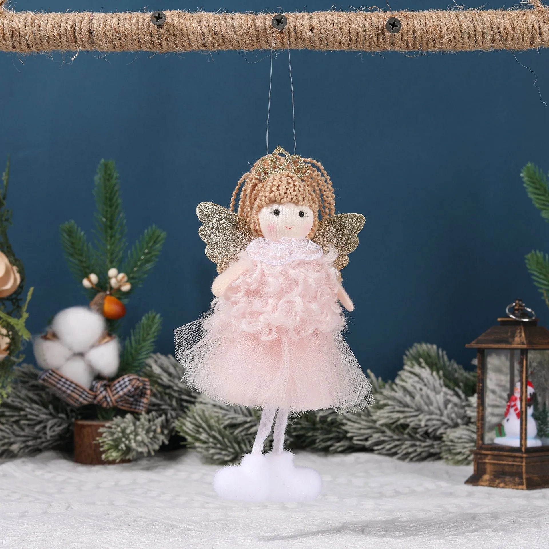 Cartoon angel cloth hair clip pendant for Christmas, shown on a high ponytail.