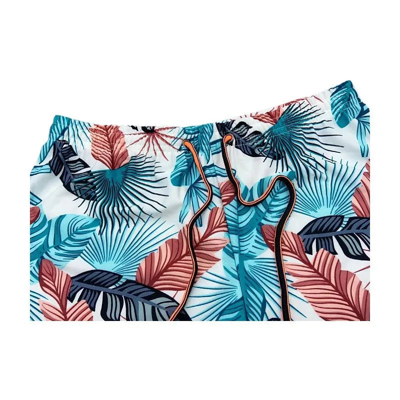 Men's cropped swimming trunks in multicolour pattern with polyester spandex fabric for beach and pool use