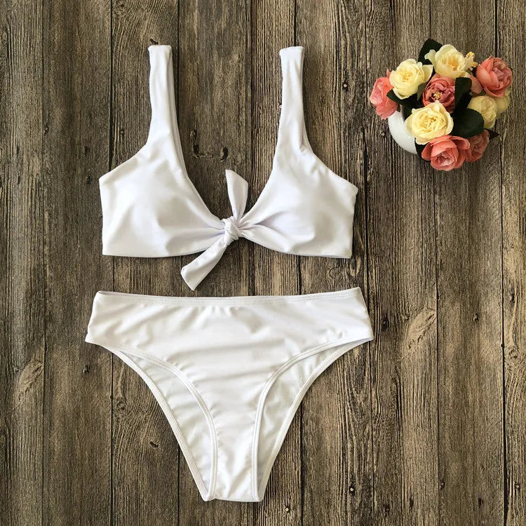 Women's solid colour bikini swimsuit set in polyester, shown in available colours.