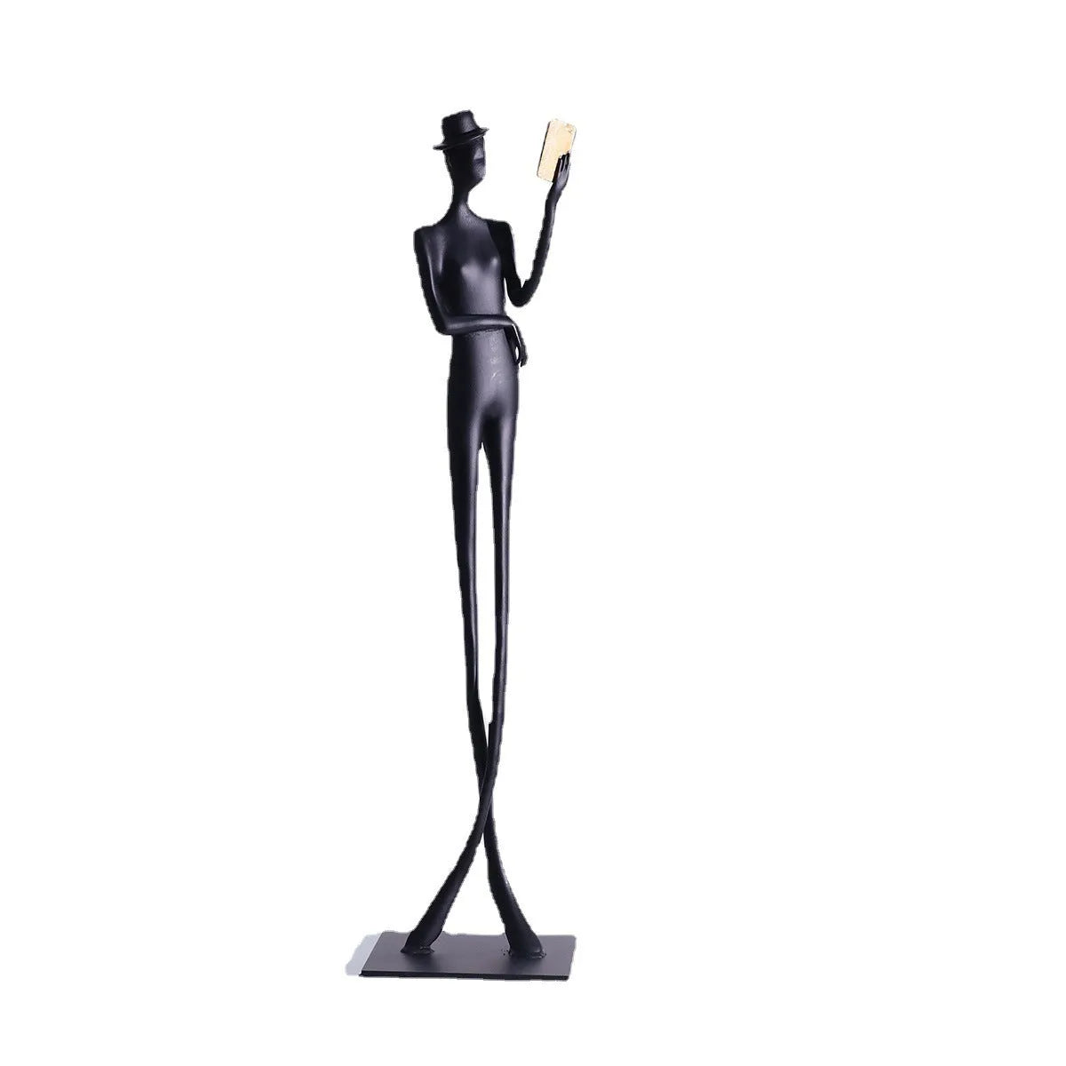 Black cast aluminium desktop sculpture of reading woman measuring 12x12x51cm
