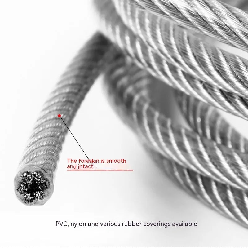 Close-up of a coiled 304 stainless steel multi-strand security cable with a coated finish.
