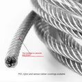 Close-up of a coiled 304 stainless steel multi-strand security cable with a coated finish.