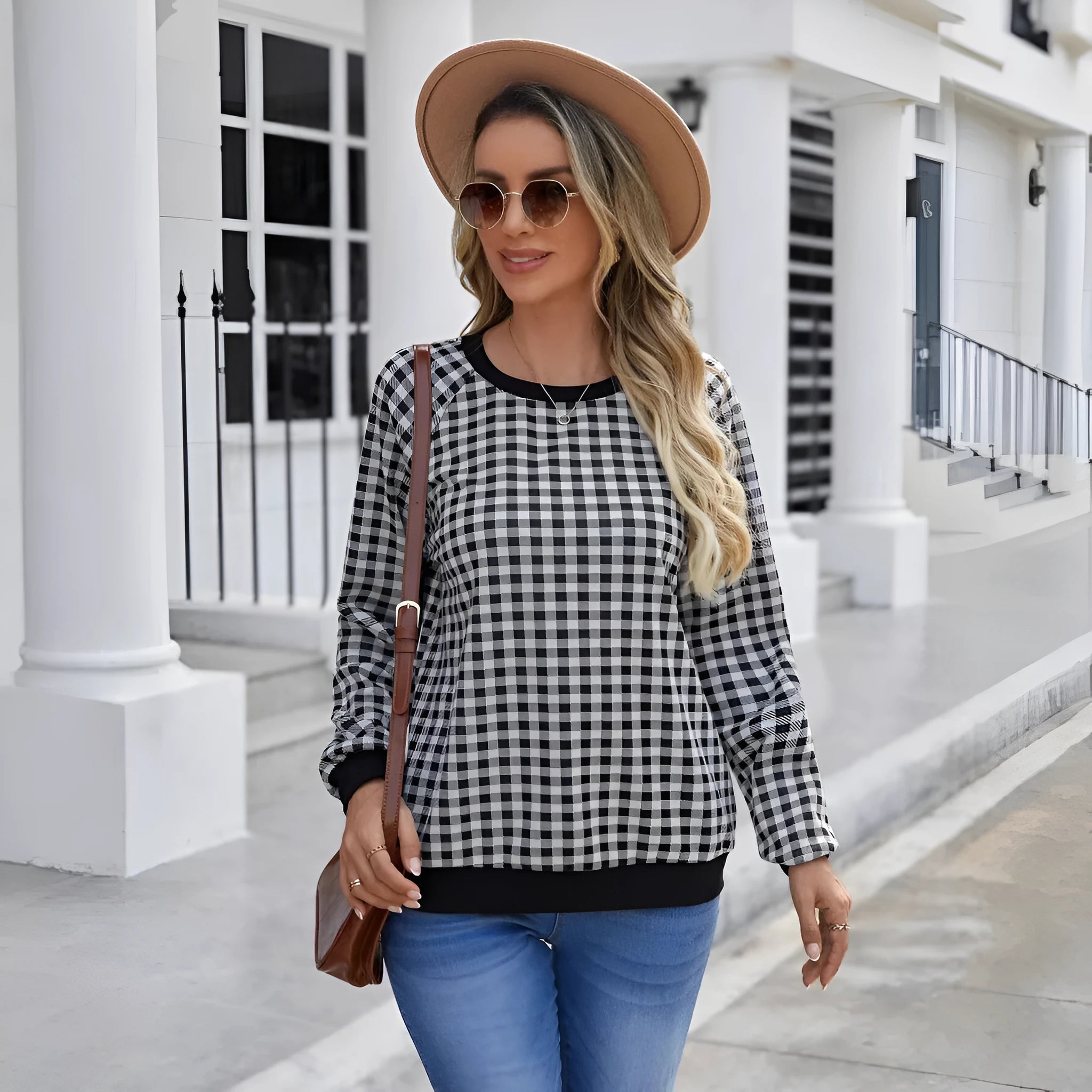Black long sleeve women's pullover sweater with a Japanese sweet plaid and stripe print pattern.