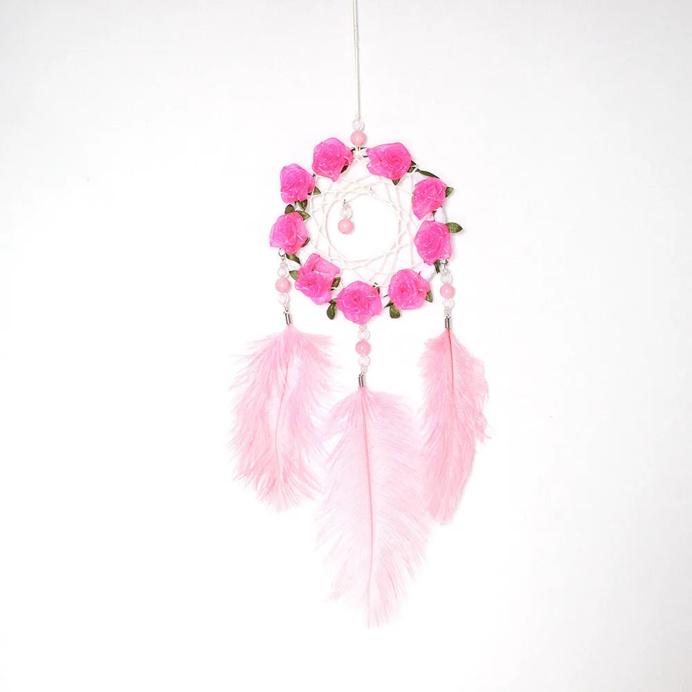 Pink dreamcatcher wind chime with ostrich feather ornaments, 10cm diameter wall decoration