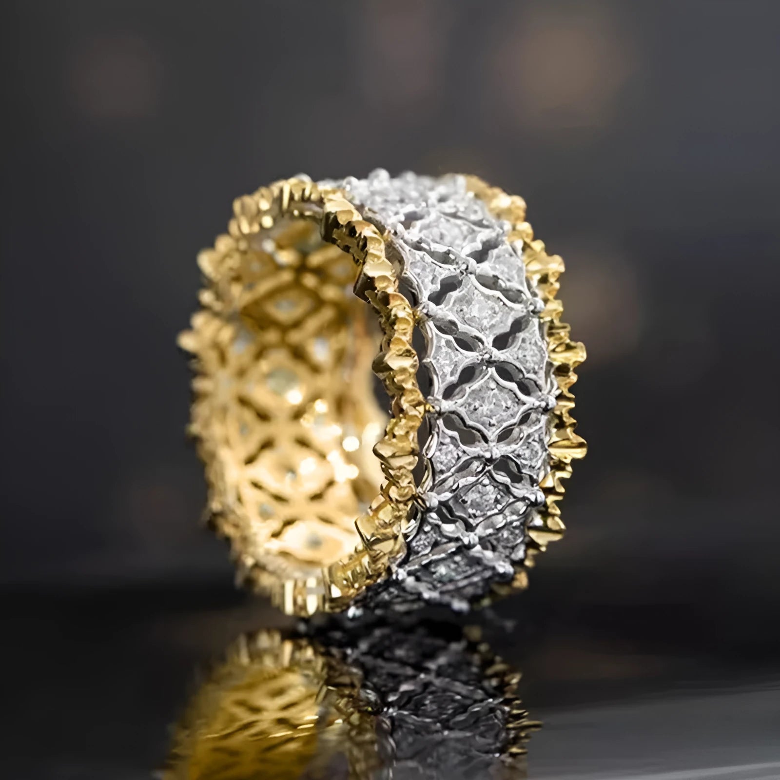 Geometric copper zircon ring with a two-tone gold and silver electroplated finish and a round stone.