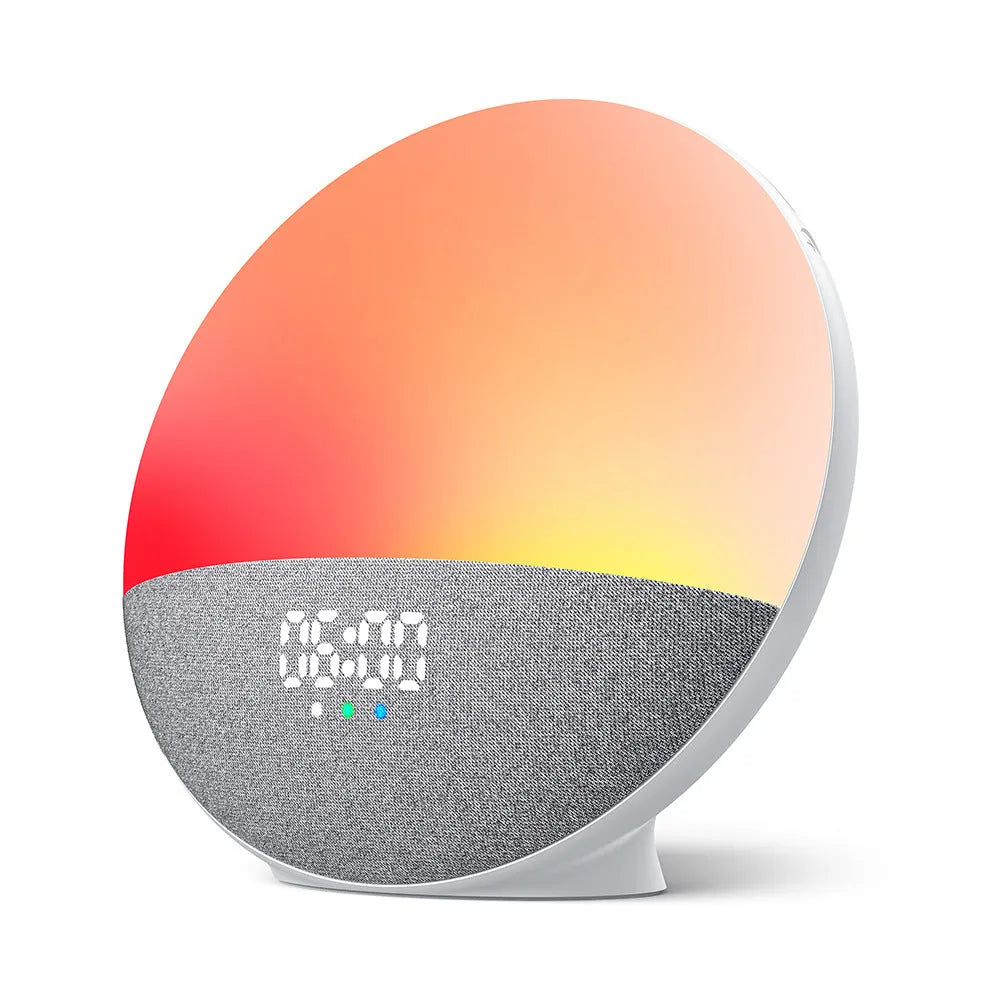White Bluetooth speaker with RGB colourful luminous lights on a table