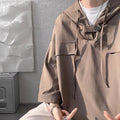 Men's grey hooded short sleeve t-shirt showing loose fit pullover design