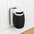 White automatic cat self-grooming brush mounted on a wall corner with soft silica gel bristles.