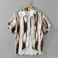 Retro black and brown striped short sleeve loose fit cotton shirt laid flat.
