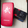 Red martial arts kick target for boxing training with hand-sewn construction and anti-knock design
