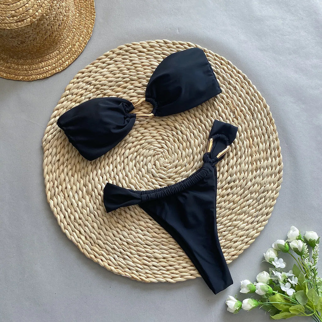 Black low waist women's bikini swimsuit with split brief shorts and bra top